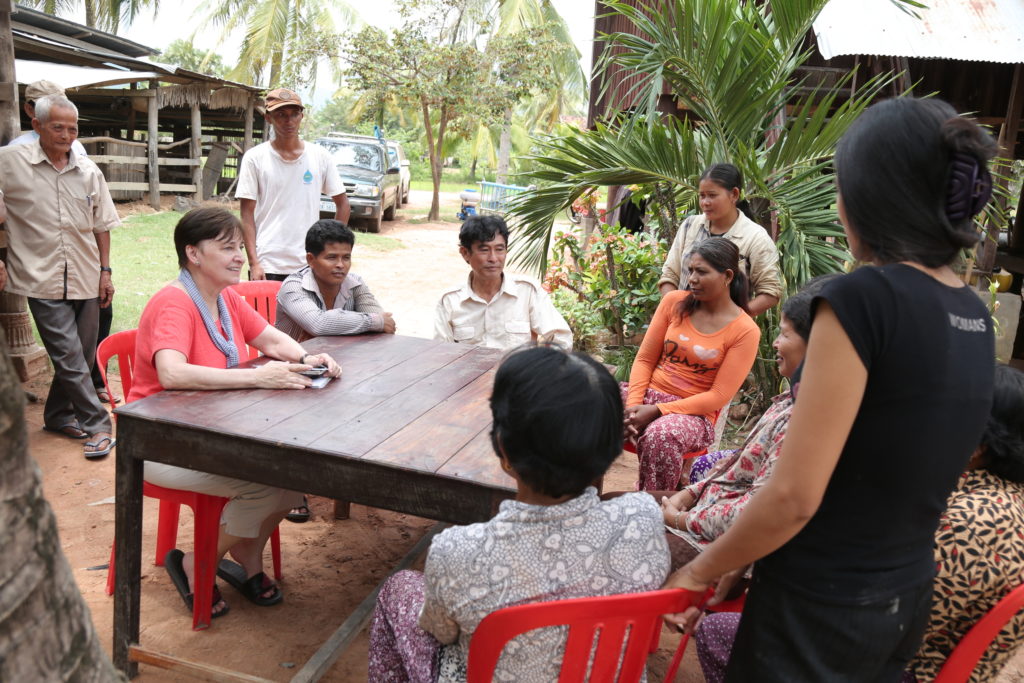 Founder and Cambodian Crew in Discussion