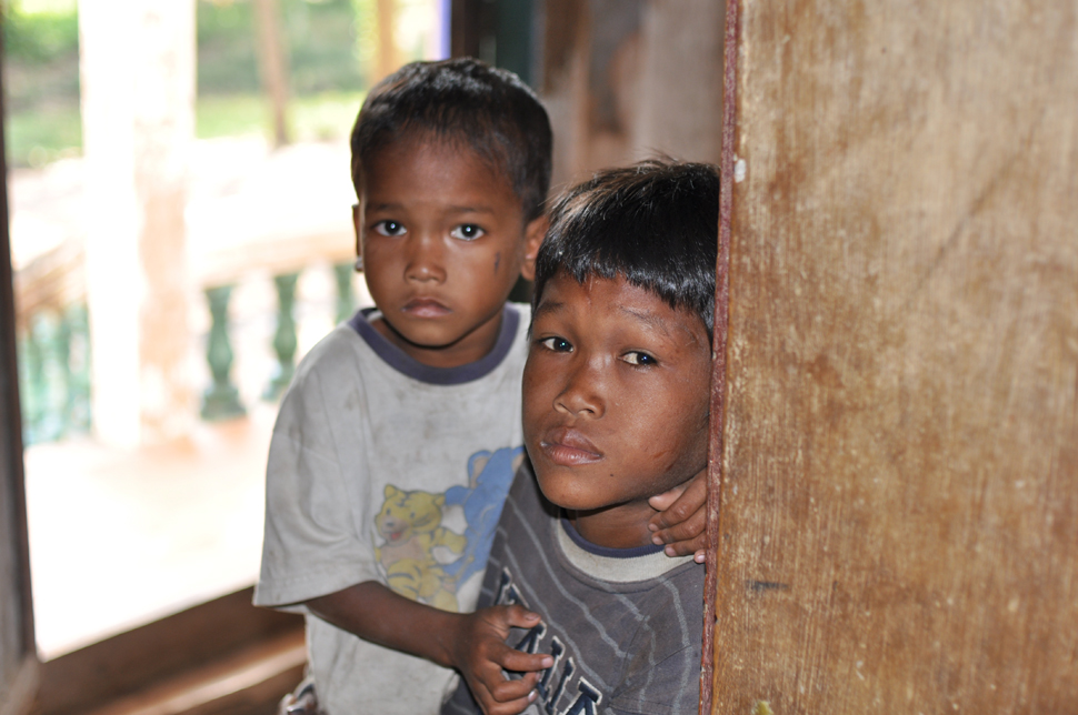 Two Cambodian boys look to the camera